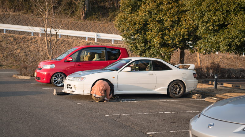 Oh you know, just casually working on your Trueno at a car park...